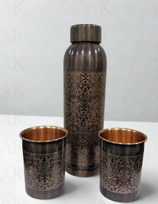 Decorative copper water bottle and two cups with antique patterns