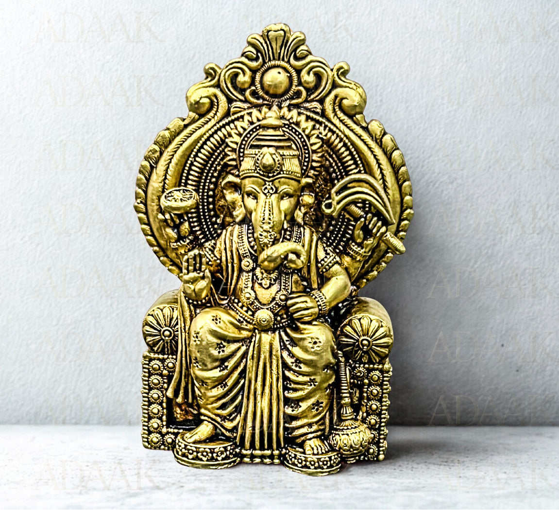 Brass Ganeshji on chair