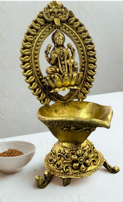 Side view of brass lakshmiji diya