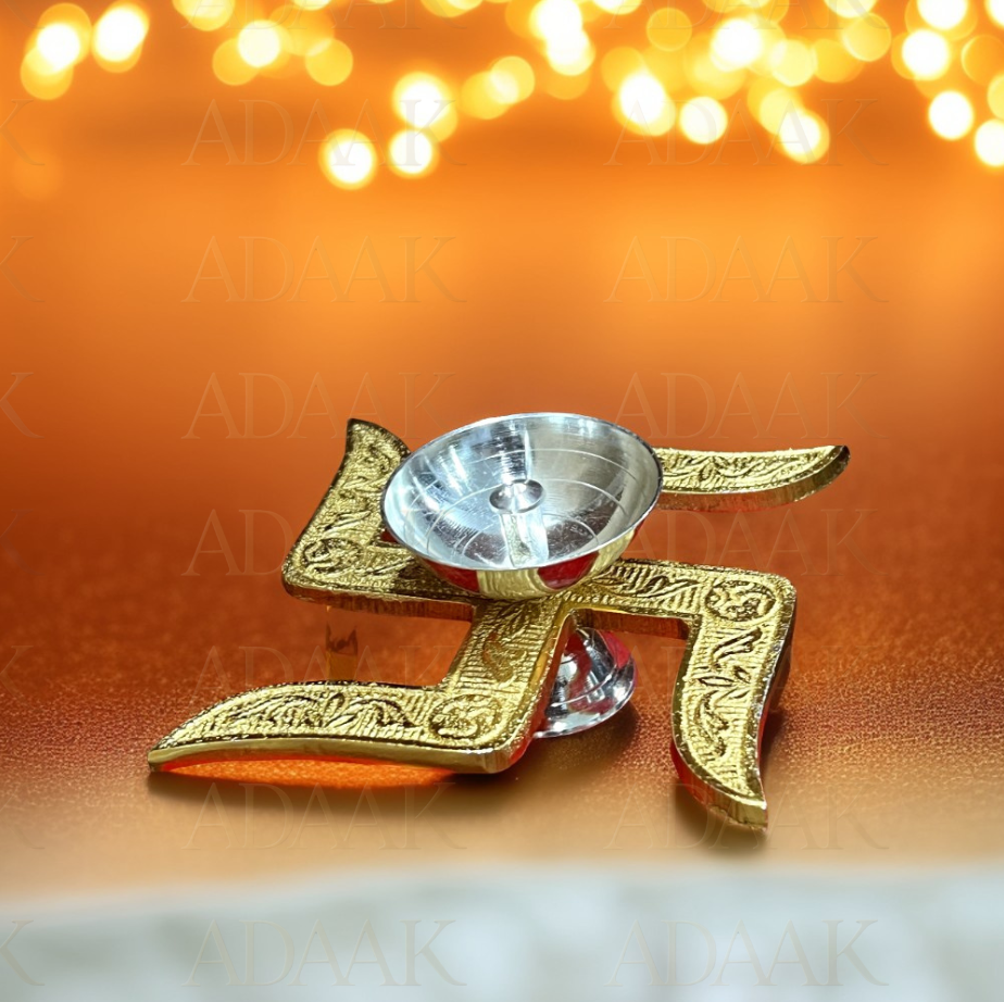 brass swastik diya