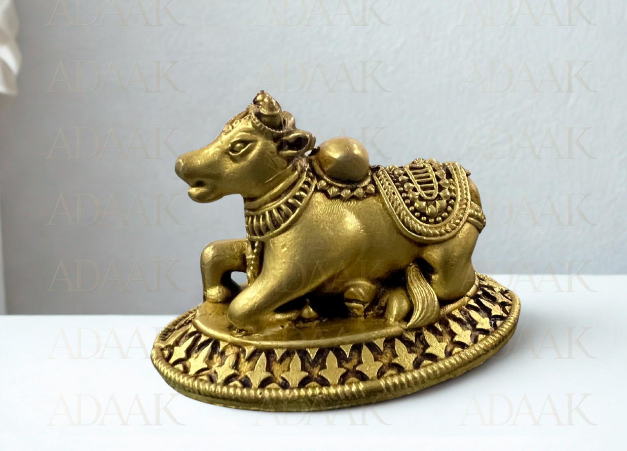 brass nandi cow side view