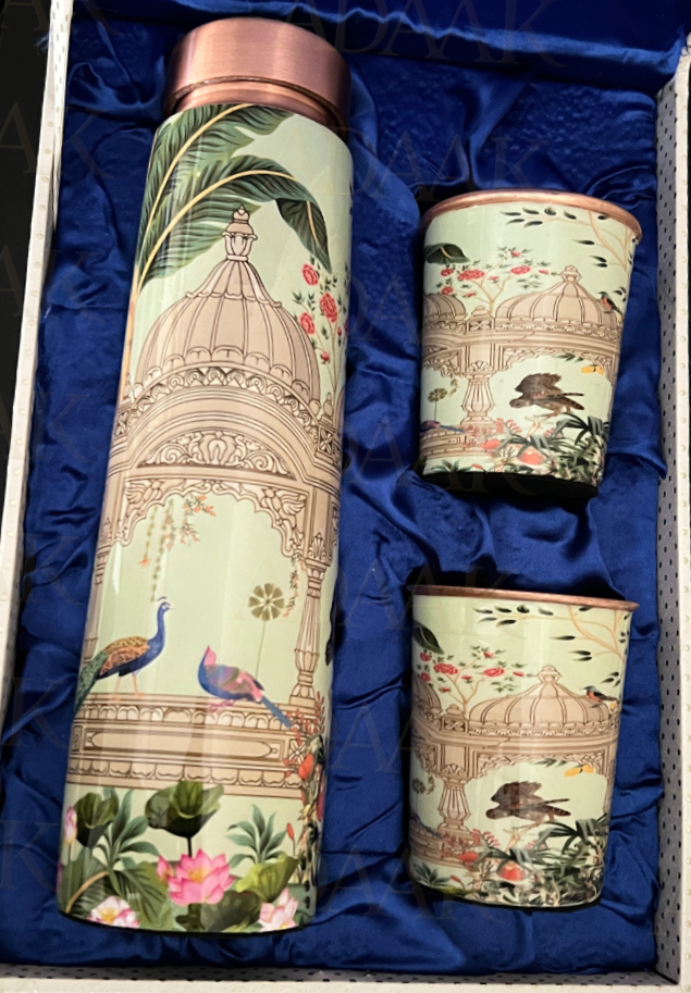 Decorative tumblers with intricate designs in a box